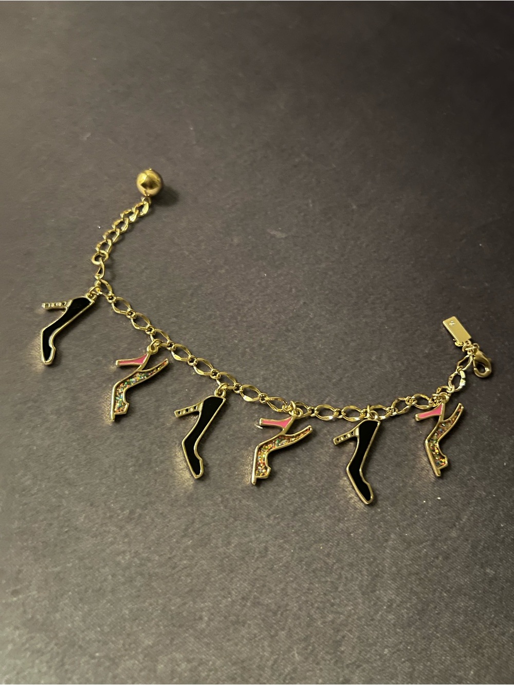 kate spade Gold-Tone High Heel Charm Bracelet with Black and Pink Accents